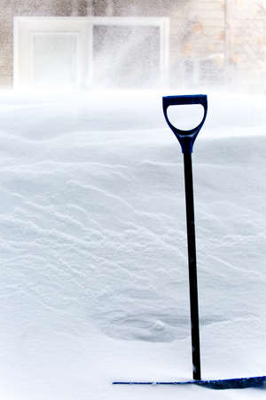 Five foot snow drift outside a house during a Wisconsin blizzardの写真素材