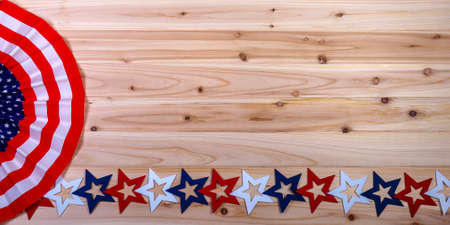 American banner and stars on a cedar board backgroundの写真素材