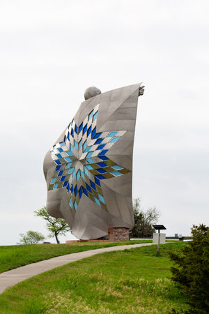 Chamberlain, South Dakota, USA, May 5th, 2021, Dignity sculpture is a 50-foot high stainless steel statue in a rest area overlooking the Missouri River, verticalのeditorial素材