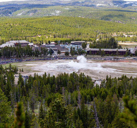 Yellowstone, Wyoming, USA, May, 25, 2021,  tourists in the Upper Geyser Basin getting ready for Old Faithful to eruptのeditorial素材
