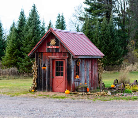 Old red shed decorated for fall in central Wisconsinの写真素材