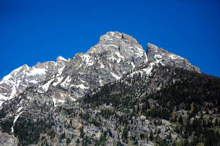 Close-up of one of the Teton mountains in Grand Teton National Park in Wyoming from Taggart Lake Trail, horizontalの写真素材