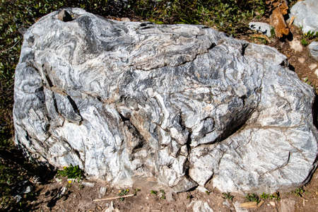 Metamorphic gneiss rock in the Grand Teton Range, Wyoming are some of the oldest rock in North...
