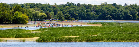 Wausau, Wisconsin, USA, July, 30, 2022: 8th Annual Paddle Pub Crawl on Lake Wausau and the Wisconsin River starting at DC Everest Park, panoramaのeditorial素材