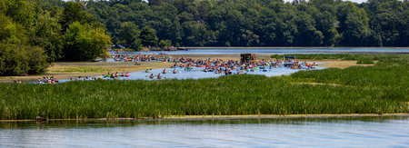 Wausau, Wisconsin, USA, July, 30, 2022: 8th Annual Paddle Pub Crawl on Lake Wausau and the Wisconsin River starting at DC Everest Park, panoramaのeditorial素材