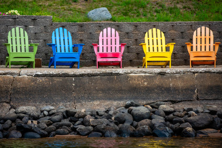 Colorful adirondack chairs on a Wisconsin lake,  horizontalの写真素材