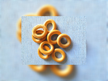 delicious bagels on a blue background with a place for text