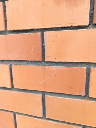 Background of brick wall texture. Close up of red brick wall.の写真素材