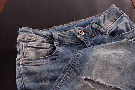top of blue womenâs jeans near aの写真素材
