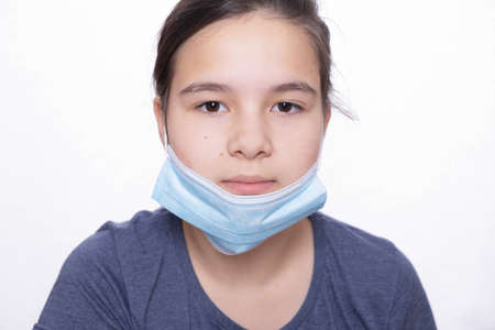 teen girl in mask on white background, isolate