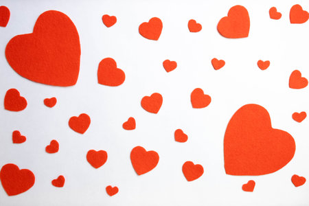 hearts of red color from material on a white background, top viewの写真素材
