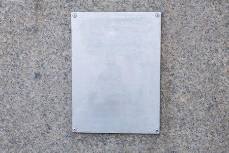 gray and blank table for information on granite wall, outsideの写真素材