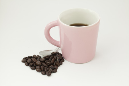 Coffee beans and cup の写真素材