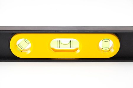 Yellow building level, Isolated on a white background 