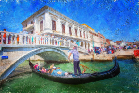 A view of the canal , boats and buildings in Veniceの写真素材