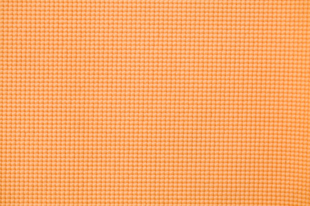 Orange yoga mat texture backgroundの写真素材