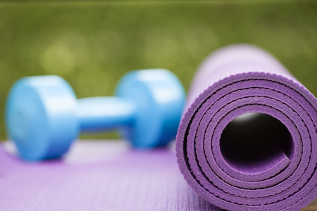 yoga mat and dumbbellの写真素材