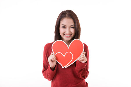 Woman holding heartの写真素材
