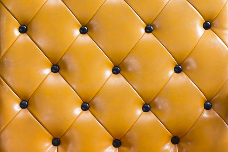Yellow Leather Upholstery Backgroundの写真素材