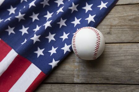 baseball with American flag in the backgroundの写真素材