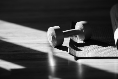 dumbbell near the window, black and white conceptの写真素材