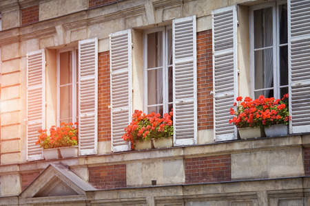 Classic style balcony with flowers at summer time