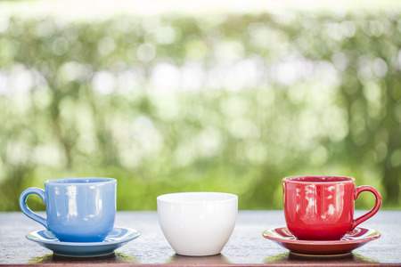 Three cup coffee on wooden and nature backgroundの写真素材