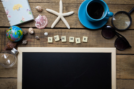 travel planning on old brown wooden backgroundの写真素材