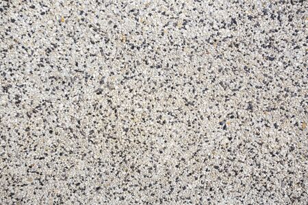 rough texture surface of exposed aggregate finish, made of small sand stoneの写真素材