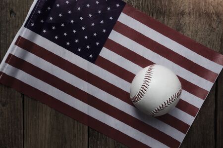 baseball with American flag in the backgroundの写真素材