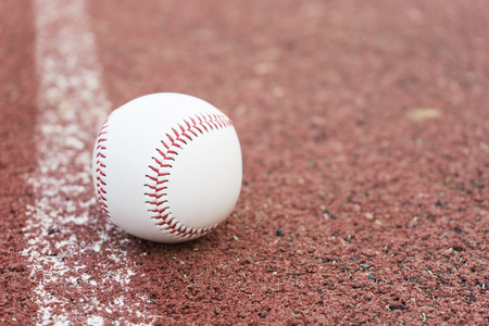Baseball on the infield chalk lineの写真素材