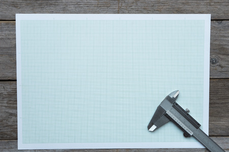 Vernier-caliper on graph paper backgroundの写真素材