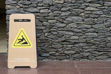 Warning sign for wet floorの写真素材