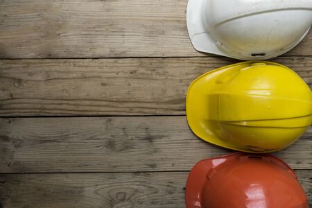 old helmets on the wood tableの写真素材