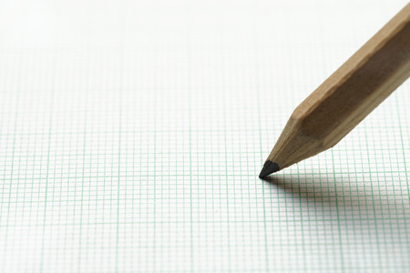 close-up pencil on graph paper backgroundの写真素材