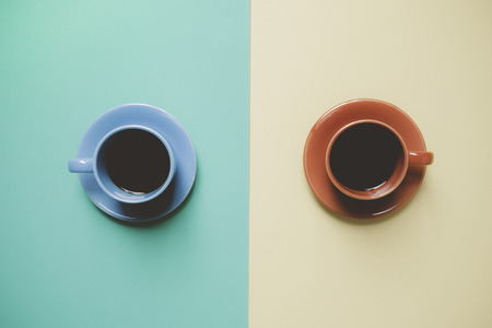 Two cups of coffee with retro filter effectの写真素材