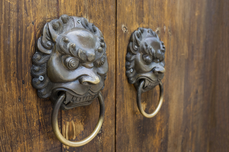 Old-fashioned steel knocker, close upの写真素材