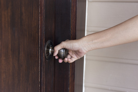 hand hold handle of wood doorの写真素材