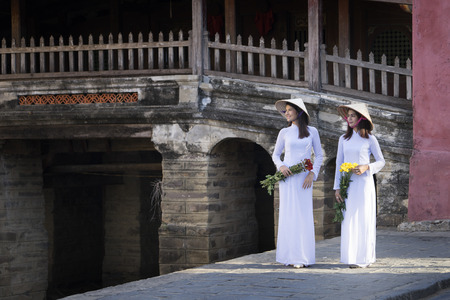 Beautiful woman with Vietnam culture traditional dressの写真素材