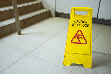 cleaning progress caution sign in public toiletの写真素材