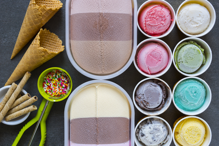 Top view Ice cream flavors in cup on blackgroundの写真素材