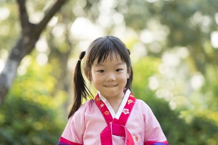 Korean child wearing a traditional Hanbokの写真素材