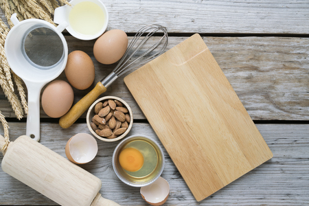 Food ingredients , kitchen utensils for cooking on wooden backgroundの写真素材