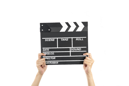 woman hold movie clapper on isolated and white backgroundの写真素材