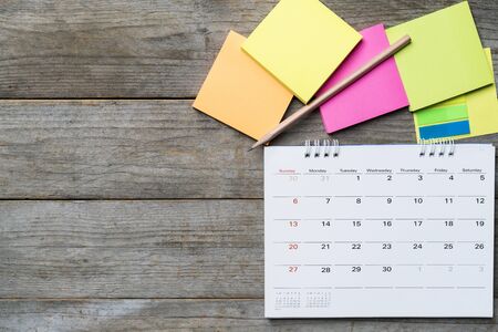 close up of calendar on the table, planning for business meeting or travel planning concept