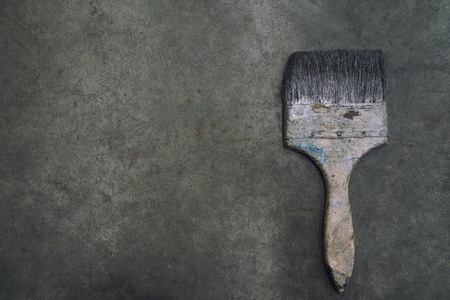 old brushes on black table backgroundの写真素材