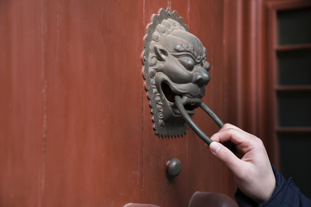 hand hold handle of door, close upの写真素材