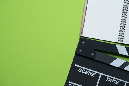 movie clapper on green background ; film, cinema and video photography conceptの写真素材