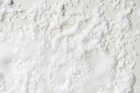Collection of various strokes splash of shaving cream or foam  on white backgroundの写真素材