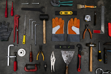 Old tools equipment on black background, engineering tool concept